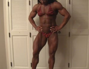 poses in sexy red panties to show you her vascular, ripped biceps