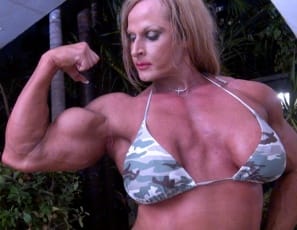 showing you her muscle control of her powerful pecs